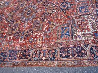 heriz rug measuring 8' 8" x 11'7" good colors good pile some wear and old moth damage as shown no holes has been cleaned 1050.00 usd plus shipping SOLD THANKS   