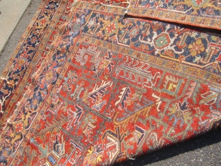 nice all over heriz rug measuring 8' 2" x 11' great colors clean rug one repair on the side as shown some loss to the ends and selvage nothing major great retail  ...