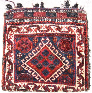 Luri bag, ivory border of double animal heads, striped kilim back, hand knotted wool pile, goat hair loops, SW Iran c.1920's, saturated colors of oxblood red, apricot, light green, on a navy  ...