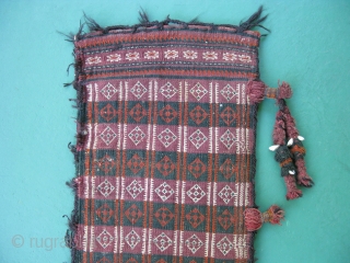 Semi-antique Baluch money bag, Pul Donneh, hand woven wool, goat hair selvage, cowrey shells, weft float brocade, both sides with pattern, Afghanistan ca. mid 20thC, general good condition with small dings, missing  ...