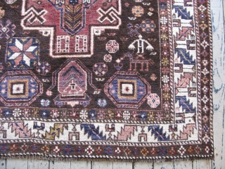 Antique Konaghend Caucasian rug, hand knotted wool on a wool foundation, Caucasus Mountains, Azerbaijan, ca.1920's, there is a small prayer niche at the bottom, human and animal figures, signed "Aranna" on one  ...