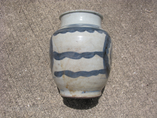 Antique Chinese porcelain storage jar, hand painted in underglaze blue, Ming Dynasty, 17th Century, heavily potted, made in 2 pieces and luted together, soiling, pitting, missing glaze to the inside bottom, glaze  ...