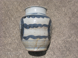 Antique Chinese porcelain storage jar, hand painted in underglaze blue, Ming Dynasty, 17th Century, heavily potted, made in 2 pieces and luted together, soiling, pitting, missing glaze to the inside bottom, glaze  ...
