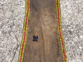 Old African modesty apron, cache sexe, for a young girl, Turkana People of Kenya, hand embroidered glass beads on hide, sinew sewn and sewn with hide strips, soiling, stiffness of hide due  ...