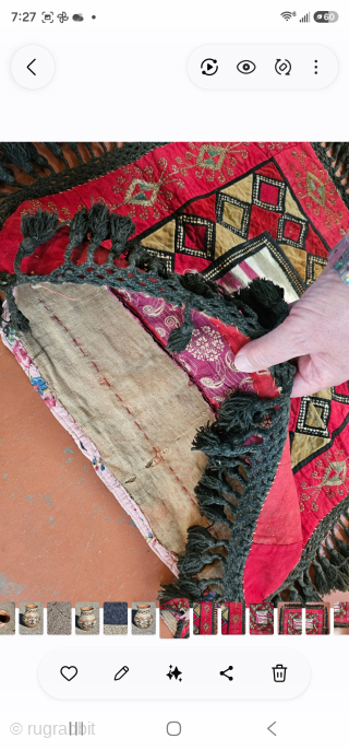 Uzbek mirror cover, hand woven silk ikat, cotton patchwork, metal thread couching with Kyrgyz ? influence in the boarder, general good used condition with some wear and staining, some missing fringe, the ...