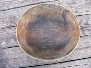 Old African wooden bowl, hand carved, Tuareg People, Sahara, ( Berber, Twareg ), used to collect milk, make dough, and other domestic chores, chiped, cracked and repaired, scuffs and scratches, this is  ...