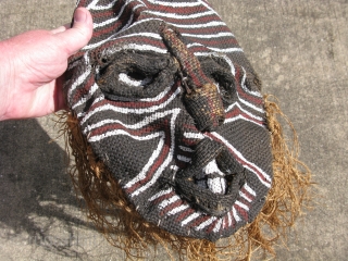 Vintage African Makishi dancer mask, Zambia, Chokwe People?, hand woven raffia with raised relief, on a metal frame, hand painted, some missing raffia, it is flattened, the tip of the top is  ...