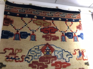 Chinese Baotou rug, size 183*107cm. The water beads spurred out from the sea water and cliffs , with lucky clouds and Buddhist 
treasures around are very beautiful. Good age excellent condition.  