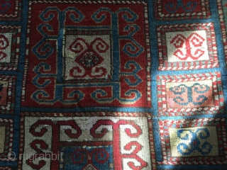 Late 19th early 20 th Caucasian with lots of Karachov features. Super thick lustrous wool. Some great colours and abrash. Love the striking design too. Small areas of repiling. Edges secured with  ...