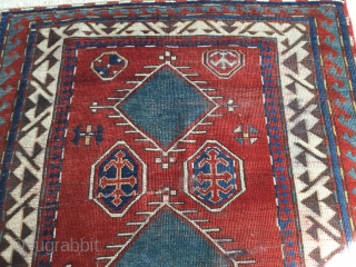 Sweet little Bordjalou. At this size and design it is usually more common to see prayer rugs. Some nice variation in the field. Repaired tear across the Middle. Bit of run on  ...