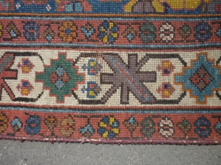 19th century Kurdish/NW Persian runner. Needs a good clean. Edges secured. Bit of a cut at one end. Some wear. Sensibly priced. Photos taken on a very bright day so a little  ...