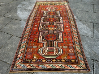 Large Shirvan in excellent condition and good design with lots of traditional shirvan elements. Good range of colours too. Ends sewn over. 131 by 290cm.        