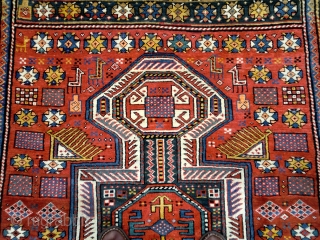 Large Shirvan in excellent condition and good design with lots of traditional shirvan elements. Good range of colours too. Ends sewn over. 131 by 290cm.        