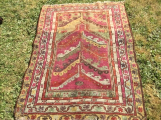 Sweet little Kirsehir from 19th century. Wonderful range of colours, green and yellows especially. Some wear and reductions at the end. Ask for more info if needed 105 by 142 cm  