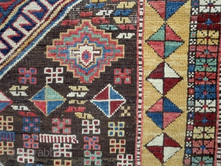 Interesting and unusual Caucasian fragment. Crammed with icons, good colours and design. Shame its not the whole piece.               
