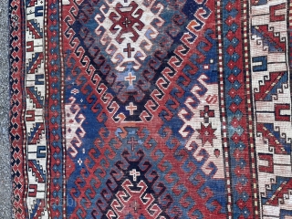 19th century Kazak, possibly bordjalou. Some wear, repile and sides secured. Priced accordingly. Decorative and good for the floor. 280 by 120cm.           