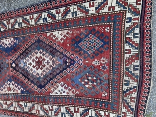 19th century Kazak, possibly bordjalou. Some wear, repile and sides secured. Priced accordingly. Decorative and good for the floor. 280 by 120cm.           