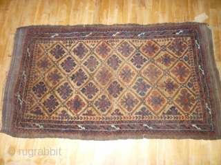 Balouch/NW Persian? Not my area or particular interest. Cute little rug with traditional colours and age. Well drawn. Goat selvedges? A few red and blue idiosyncracies in one half of the rug.  ...