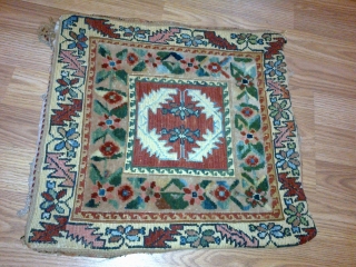 An 150 year old persian hand woven rug. size 50cm * 50cm                     