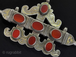 Antique Turkmen - Karakalpak Tribe Silver Tumar Pendant Fire Gilded and with Carnelian.
They use turkmen women to write the evil eye verse on the tumar box and not to touch the eye.Turkmen  ...