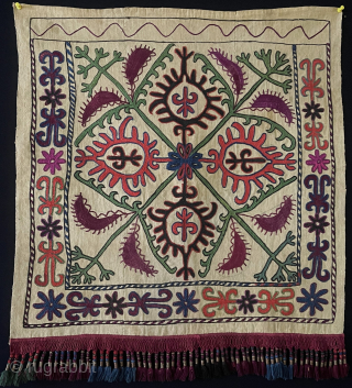 Antique Kyrgysyztan Silk Embroidered Yurt Hanging Decoration. Mostly silk and only red color wool embroidered on hand loomed cotton with silk tassels. Natural colors from vegetable dyes. Circa - 1900 - 20s.  ...