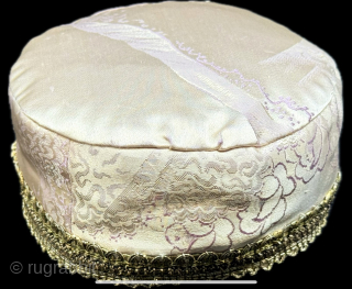 Antique traditional silk brocade and metallic embroidered child skullcap. İt has a plain cotton. İt is in great condition. Size : 2.5'' x 17'' - Height : ''7 cm x Circumference :  ...