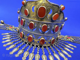 Turkmen ceremonial women silver crown. An crown item for Turkmen tribes to use it on wedding and other important days. It has great patina from use and survived in respectful dowries to  ...