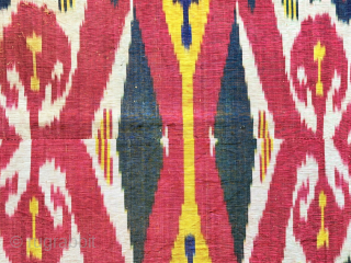 Antique Uzbekistan silk adras ikat fragment. Amazing saturated colors from natural dyes. It has plain fine red cotton backing. Fairly in good condition. Size - 30.5'' x 16'' - ''77 cm x  ...