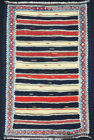 East Turkey Kurdish mini cradle kilim. They cover sleeping baby cradles with such mini kilim. İt is all wool on cotton with minimalist design. It has been carefully used for some time ...