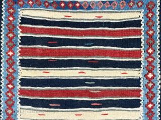East Turkey Kurdish mini cradle kilim. They cover sleeping baby cradles with such mini kilim. İt is all wool on cotton with minimalist design. It has been carefully used for some time ...
