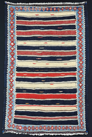 East Turkey Kurdish mini cradle kilim. They cover sleeping baby cradles with such mini kilim. İt is all wool on cotton with minimalist design. It has been carefully used for some time ...