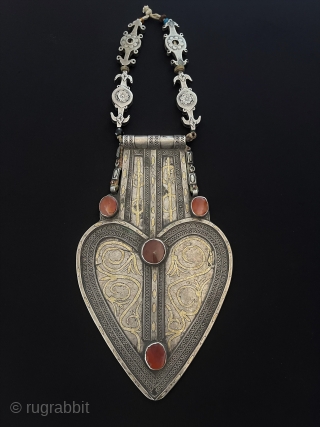 Central-Asian Antique Turkmen Tribal Silver Asyk - Pendant Gilded with Carnelian and Gemstone This is a Collector Art Turkmen Jewelry Circa - 1900s Size - Lenght : 48 cm - Asyk :  ...