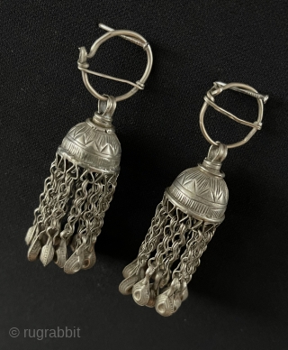 Antique Pair of Uzbek Tribal Silver Earrings with Silver Tassels. Circa - 1900 Great Condition. Size - Height : 7.5 cm - Circumference : 7 cm - Weight : 25 gr. turkmansilver@gmail.com 