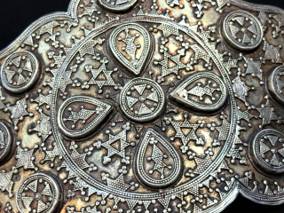 Kazakhstan ceremonial silver belt buckle. A nice hand made silver belt buckle with gilded background. It has great patina. Traditional spotted Kazak design. Survived in great condition. Size : (8'' x 5.5'') ...