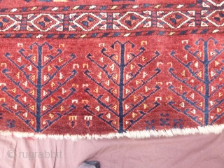 Ersari Chuval - Low in pile, missing fringe on bottom of skirt, small repair to top edge as shown.  Dimensions: 145 x 87 cm (57 x 34 inches).    