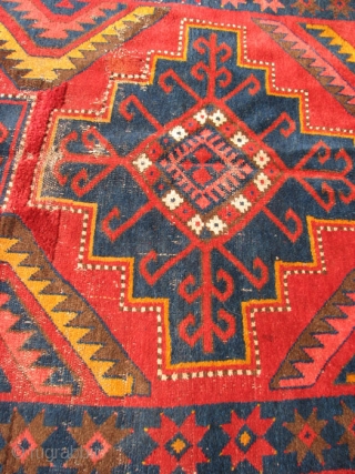 Kirgiz Carpet,Central Asia,  Wool, 53 x 105 inches, In rather rough condition with spots of wear and some incomplete repairs that need to be clipped.  A little work would improve  ...