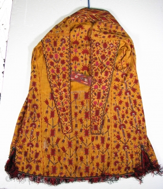 Turkmen Chyrpy, Silk Embroidery on Handwoven Silk Cloth, Block Print Cotton Backing, 42" Long x 32" Wide

This is one of the earliest Turkmen Yellow Chyrpy I have seen.  The designs are  ...