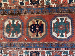 Pre commercial kazak probably mid 19 c with unusual design and the saturated natural dyes we would expect from that age. 
Size 232 x 136. Hand washed old repairs to corroded brown  ...