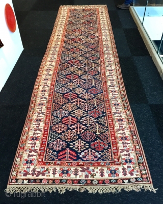 Lovely north west Persian shrub design long rug. 
First half 19 c in excellent condition all original sides and end finishes.
Lots of lovely aubergine and as you would expect great wooland weave  ...