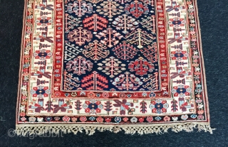 Lovely north west Persian shrub design long rug. 
First half 19 c in excellent condition all original sides and end finishes.
Lots of lovely aubergine and as you would expect great wooland weave  ...