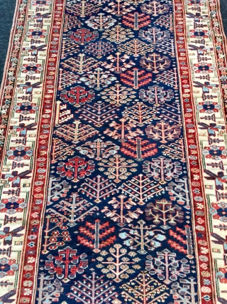 Lovely north west Persian shrub design long rug. 
First half 19 c in excellent condition all original sides and end finishes.
Lots of lovely aubergine and as you would expect great wooland weave  ...