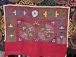 this is a lovely old Tush Kyiz embroidered yurt decoration from Kyrgyzstan.  Size 237 x 145 cm dating from mid 20 c or a bit before so 70 + years old.  ...