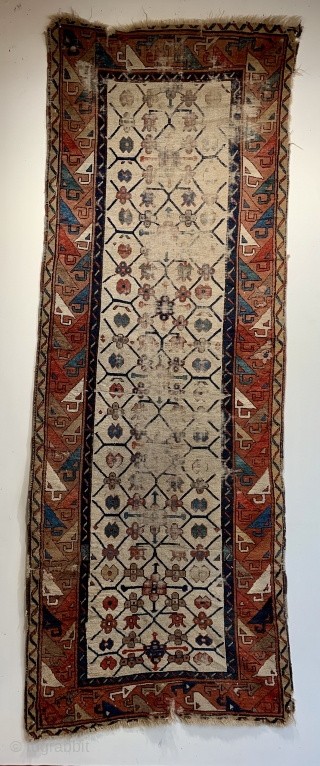 here is an early 19 c runner probably eastern Kurdistan size 273 x 99 cm.  Very rare piece could be restored           