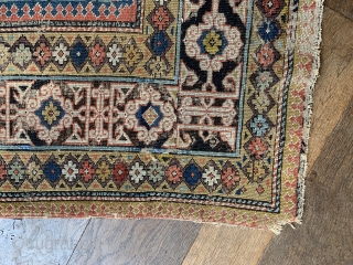 Early shirvan rug with powder blue field and Kufic border ca 1820 one old patch and darning to the corroded brown 
Not many rugs  this old on the market.    ...