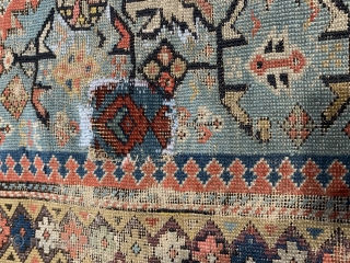 Early shirvan rug with powder blue field and Kufic border ca 1820 one old patch and darning to the corroded brown 
Not many rugs  this old on the market.    ...