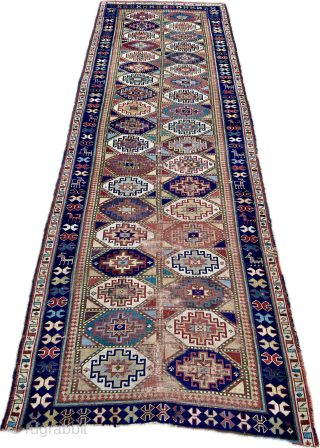  nice old north west persian runner with great colours including purple. Memling Gul design mid 19 c size 317 x 107 cm.  One end slightly missing and worn.  Repairable  ...