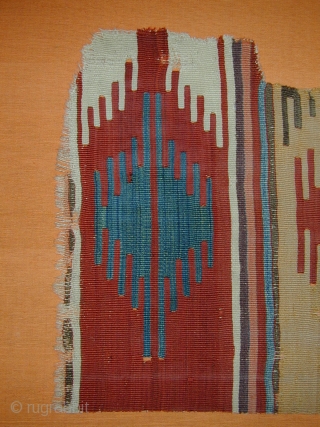 Large Sivas multiple niche prayer kelim fragment early 18C.Great colours including aubergine. size 123 X 61 cm
Mounted on heavy wooden stretcher hand dyed conran fabric (164 x 79 cm)    