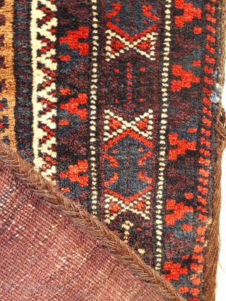 very nice and complete antique Baluch balisht ca 1900 size 72 x 49 cm.
Full pile with super glossy wool and original plain weave back.  Few spots of probably analine orange around  ...