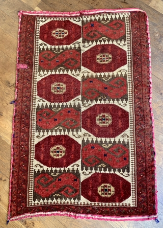 rare antique Uzbek rug with ikat design purchased in Afghanistan in the 1970 s.  Unusually this rug has all natural dyes the browns are undyed wool.  Edged with Russian or  ...