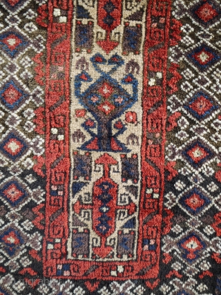 nice antique Baluch balisht ca 1900 in full pile. All wool colours all seem natural has a very pale green in spots which has faded slightly. Ends nibbled and secured interesting "tobacco  ...